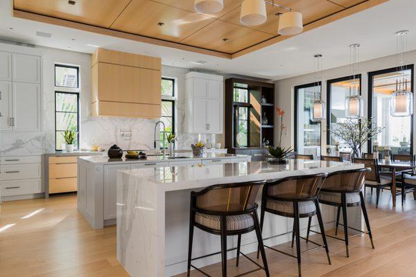 We love this two-island, modern kitchen. Mixed perimeter and island finishes give this a clean and sleek look.