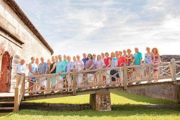 The Realty World - First Coast team on one of the bridges at Fort Macon State Park.