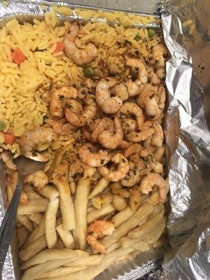 Pan or garlic shrimp, yellow rice and fries.