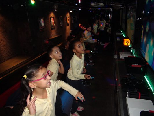 Playing Just Dance inside the game truck