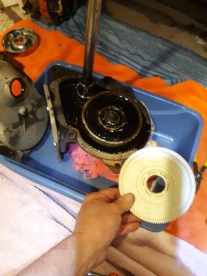 bad drive gear in beltless, top load  whirlpool washer transmission, ready to replace gear