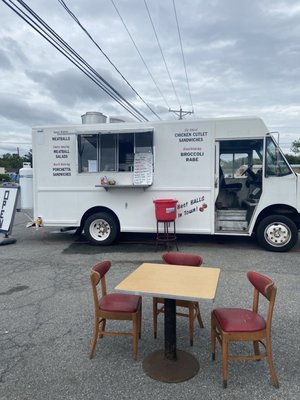 Food truck with a lil outdoor seating