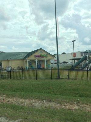 Outside, gated with playground