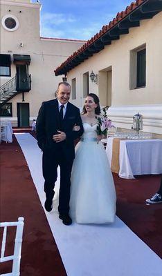 My husband's smile was picture perfect as he walked our daughter down the aisle.