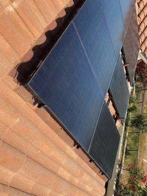 Solar panels after cleaning and Solar panel kit, mesh system installation to keep birds of the solar panels.