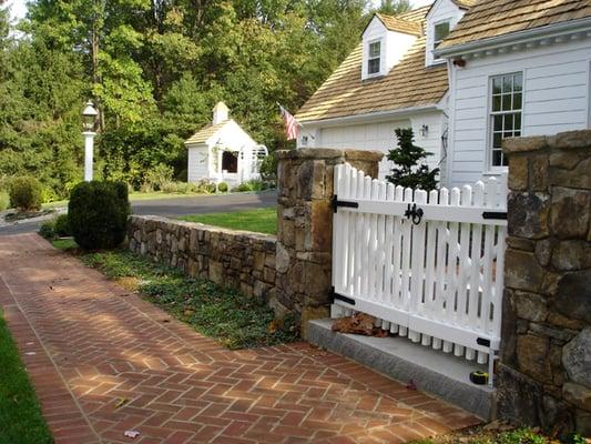 Stone Wall and White Picket Gate in McLean, VA by Land Art Design, Inc.