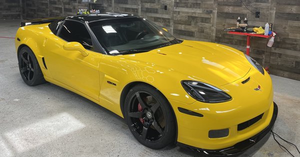 Road Ready! Corvette with gloss black roof wrap, paint correction & topped off with a ceramic coating!