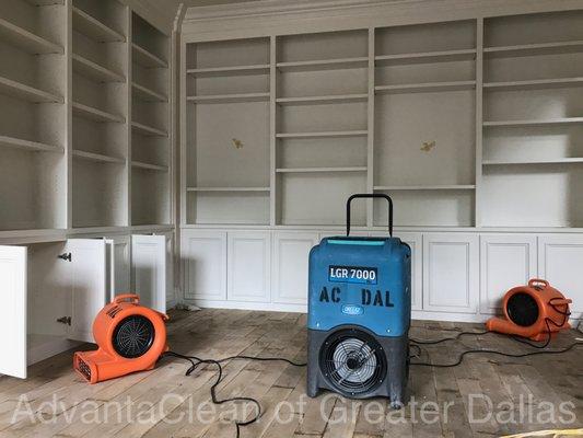 Fans and dehumidifiers are placed to take the moisture out of the air.