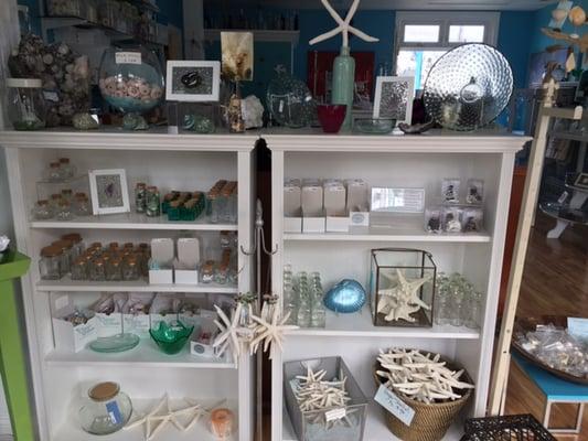 We have sea treasure collecting jars, shells, starfish and sea glass art