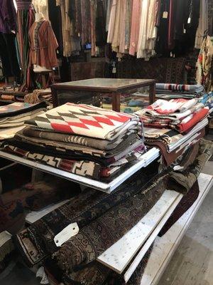 Lots of vintage rugs and blankets