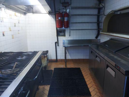 This kitchen was the worst I have ever seen before this photo was taken. The next day they had a health inspection and they passed.