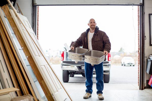 Man donating kitchen sink.