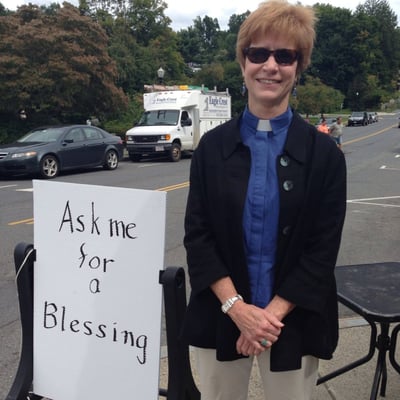 Reverend Vicki Kemper, pastor of First Congregational, United Church of Christ in Amherst, offering " Blessings to Go".