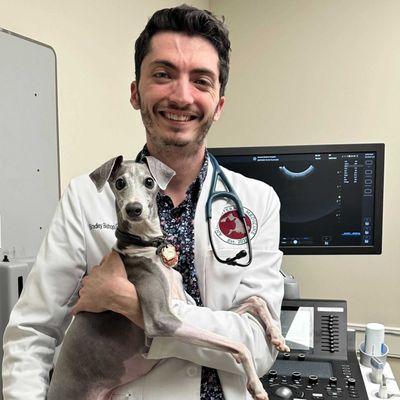 Dr. Bishop our Internal Medicine specialists with his patient Murphy.