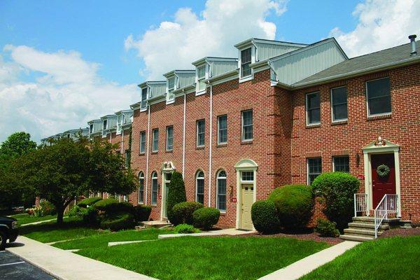 Exterior of our Blue Meadow townhomes featuring beautiful brick detail.