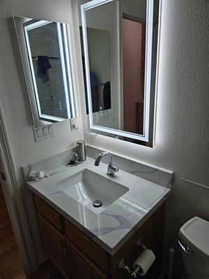 Guest bathroom after Jean's remodel + new mirror w lights