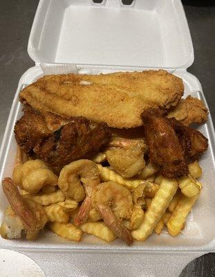 Fried fish, shrimp, & wings with fries