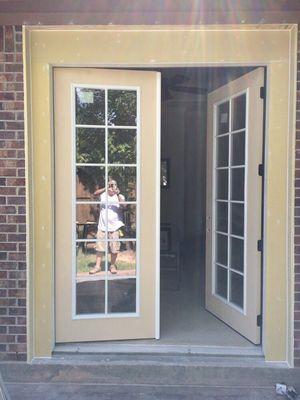 This set of doors. We pulled out a pair of windows and cut the brick and installed them.