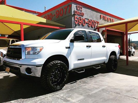 2013 Toyota Tundra Crew Max 4X4. Toy Tec leveling kit, Toy Tec rear air suspension, aftermarket wheels and tires. Stock #7965