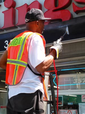 Kings Pharmacy in Brooklyn getting a power washing.