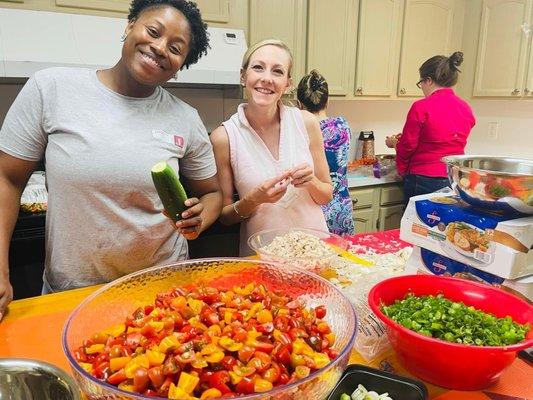 Preparing meals for our families at Sanctuary on 8th. Combating food deserts one community at a time.