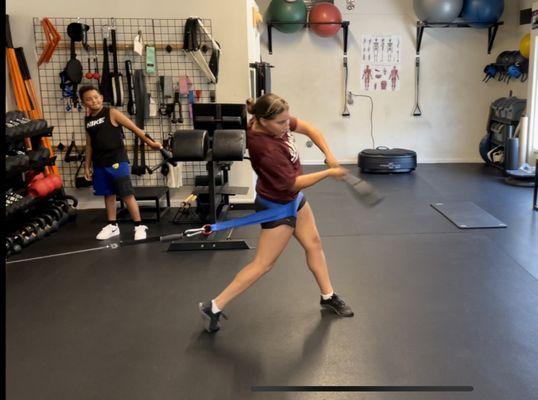 Kaylee working on her hip rotation to improve power for her swing.