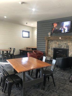 Inside seating - fireplace and TV in the background