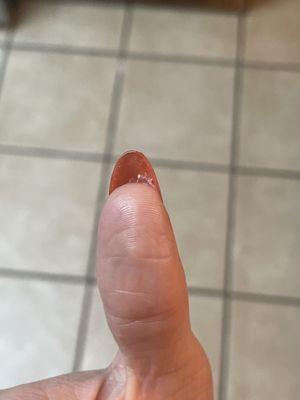 Glue shows under most nails