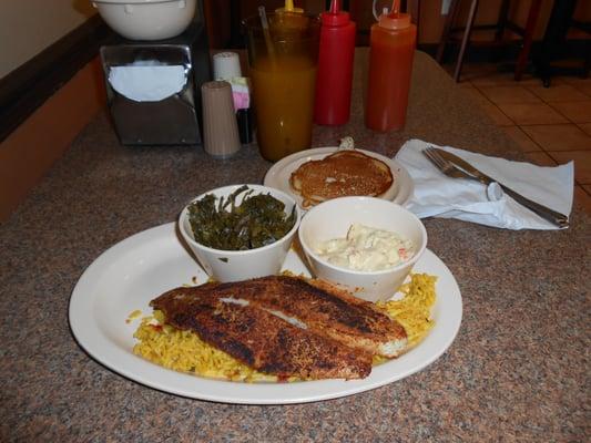 Blacken fish,greens,tater salad, and corn griddle cake.