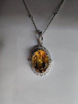 White Gold Estate piece Oval Citrine stone on 10k  Filigree mounting. with a Diamond chain.