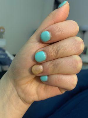 Gel mani done a few hours ago (because of how far out the polish is from the cuticle, it looks like my nails already grew out)