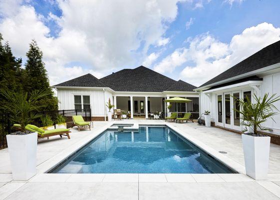 Luxury outdoor gunite swimming pool with patio