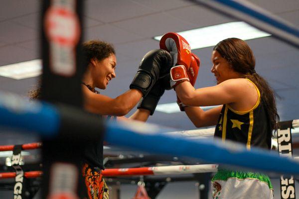 Have a blast learning Muay Thai at Impact. Our engaging program, led by passionate instructors, combines fun and skill-building.