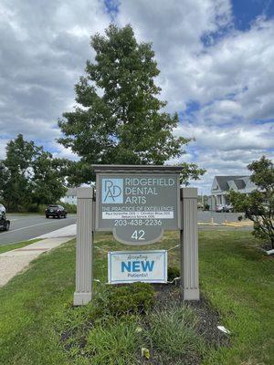 Sign for Ridgefield Dental Arts at 42 Danbury Road in Ridgefield.  Now accepting new patients!