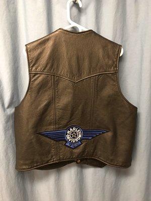 Biker vest with wing patch.