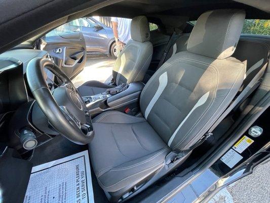 The interior after detailing (please ignore the reflection on the seat)