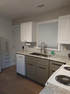 Bottom gray cabinets.