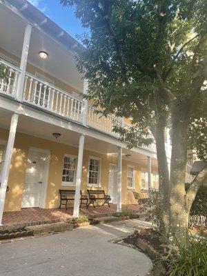 The rooms connected to the house (the carriage houses)