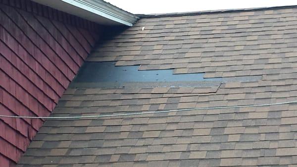 Shingles installed by E&J fell off, 2015