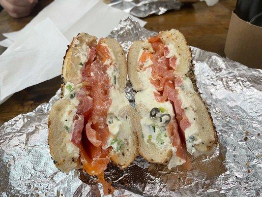 Lox and scallion cream cheese on everything bagel