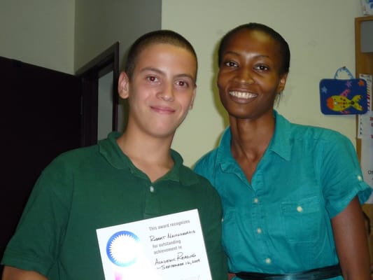 One of our student success stories, Robert, and his Sylvan teacher, DeAsia.