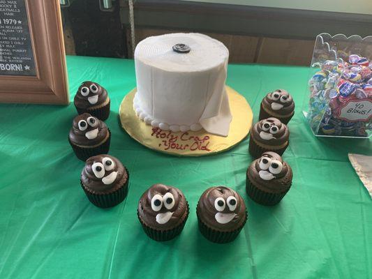 The 'Holy Crap Your Old' cake and cupcakes they made for my sister's surprise 40th