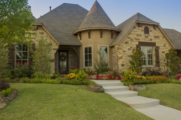 A brightly colored front landscape by Red Valley Landscape & Construction in Oklahoma City, OK.