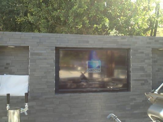 Everyone should put a tv near their barbecue! It makes your backyard that much more enjoyable in the summer.