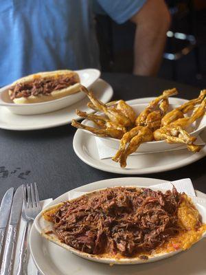 Frog legs with South Carolina sauce and Nathan's hotdog with pulled pork (in back)