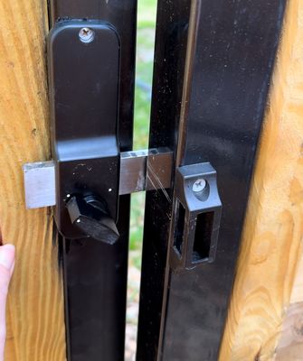 Gate sags so the lock keeps it from shutting.