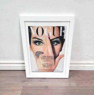 60's inspired Vogue cover with pure white matte and a glossy white frame