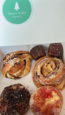 Cinnamon Bun, Canelés, Morning Bun, Nutella and Raspberry Lemon Curd Bun