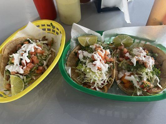 Pork carnita deluxe taco (left), broiled fish deluxe taco (middle) and shrimp taco deluxe (right).