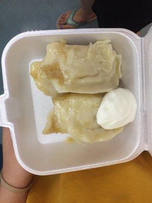 Potato pierogi w/potato filling & sour cream